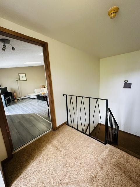 11 Echo Ct Unit 17, Vernon Hills, IL 60061 - stairs featuring carpet flooring