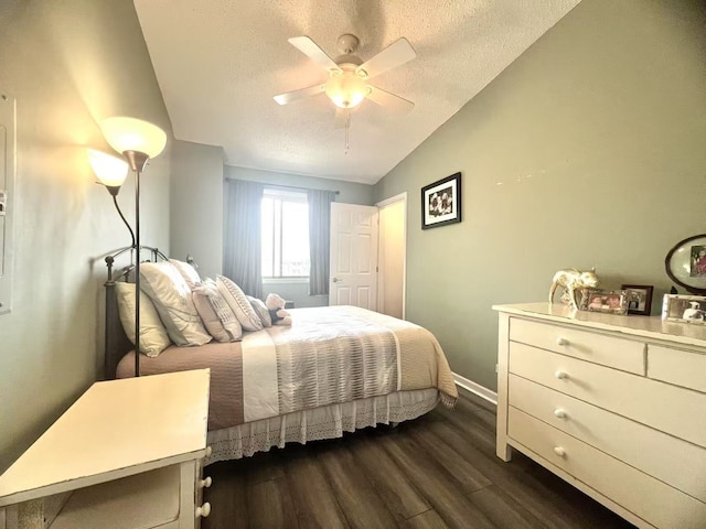 11 Echo Ct Unit 17, Vernon Hills, IL 60061 - bedroom with lofted ceiling, dark wood finished floors, a textured ceiling, and ceiling fan