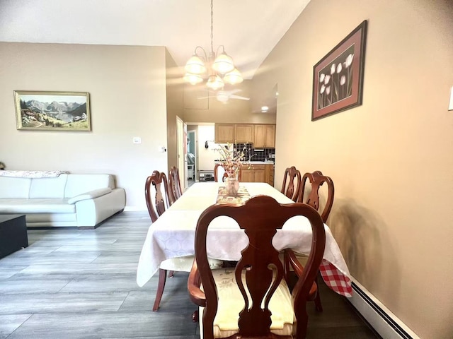 11 Echo Ct Unit 17, Vernon Hills, IL 60061 - dining room featuring a chandelier, wood finished floors, and high vaulted ceiling