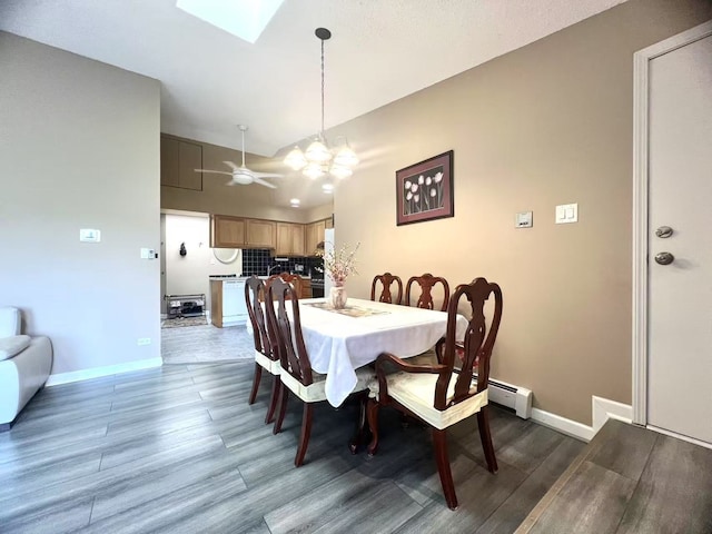 11 Echo Ct Unit 17, Vernon Hills, IL 60061 - dining space featuring wood finished floors, a skylight, and ceiling fan