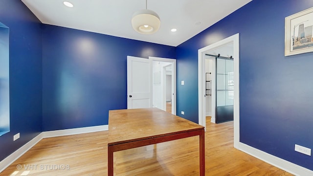 117 S Grove Ave, Oak Park, IL 60302 - unfurnished office with a barn door, light wood-style floors, and recessed lighting