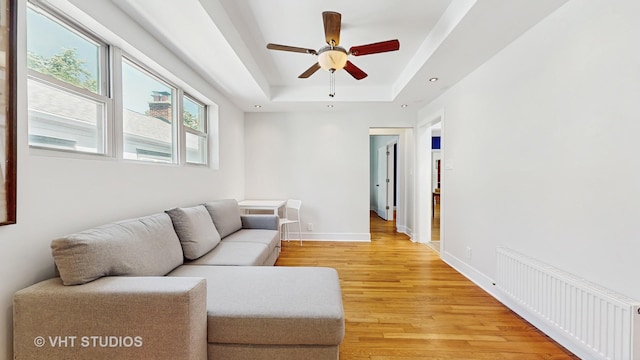 117 S Grove Ave, Oak Park, IL 60302 - living room with ceiling fan, a raised ceiling, light wood-type flooring, radiator heating unit, and recessed lighting