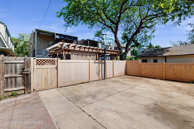 117 S Grove Ave, Oak Park, IL 60302 - fenced backyard featuring a gate and a patio