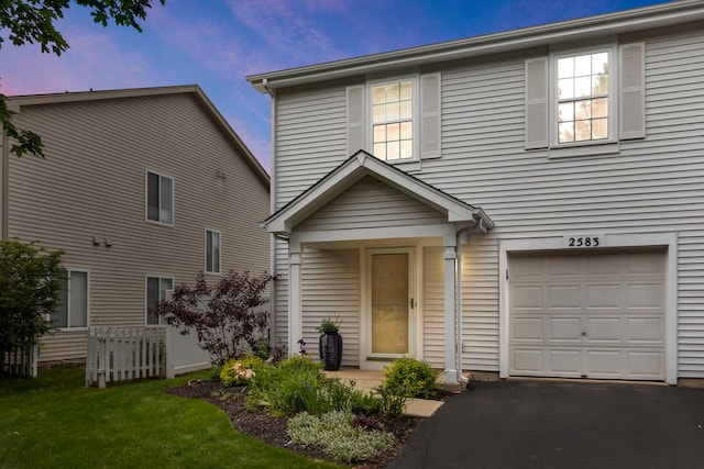 2583 Warm Springs Ln, Naperville, IL 60564 - view of front of house featuring an attached garage and asphalt driveway