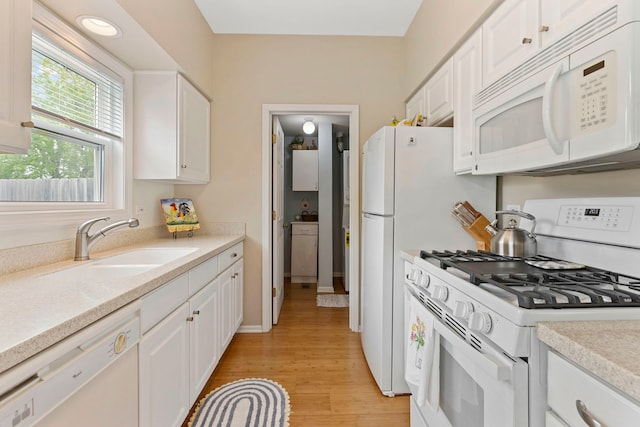 2583 Warm Springs Ln, Naperville, IL 60564 - kitchen featuring white appliances, white cabinetry, light wood-type flooring, and light countertops