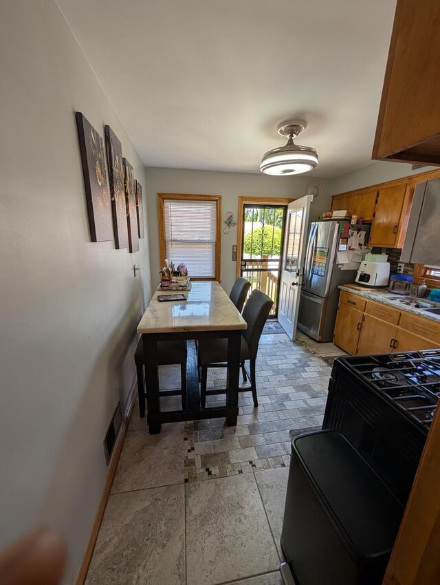 dining room with baseboards