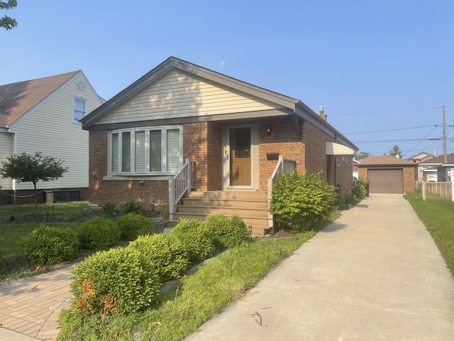 10505 S Central Park Ave, Chicago, IL 60655 - view of front facade with brick siding, an outbuilding, a garage, and a chimney