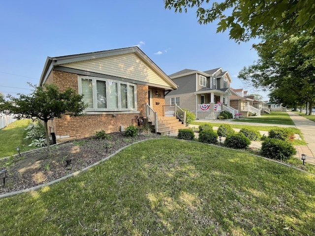 10505 S Central Park Ave, Chicago, IL 60655 - view of front of house featuring brick siding and a front yard