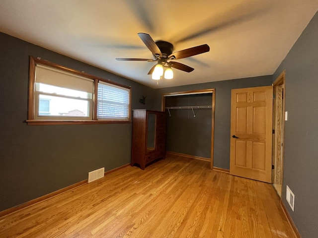 10505 S Central Park Ave, Chicago, IL 60655 - unfurnished bedroom with light wood finished floors, a closet, and ceiling fan
