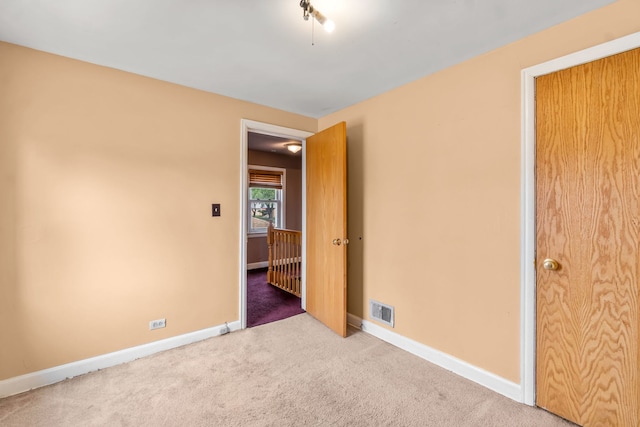 3914 Madison St, Bellwood, IL 60104 - unfurnished bedroom with carpet and baseboards