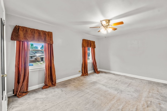 3914 Madison St, Bellwood, IL 60104 - carpeted empty room featuring a ceiling fan and baseboards