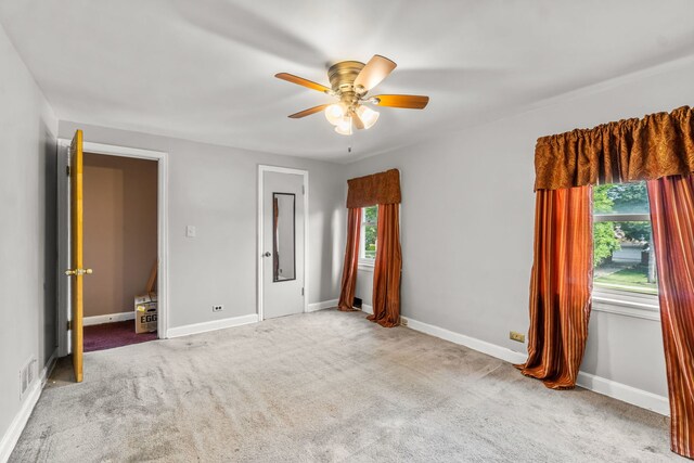 3914 Madison St, Bellwood, IL 60104 - unfurnished bedroom featuring carpet floors and ceiling fan