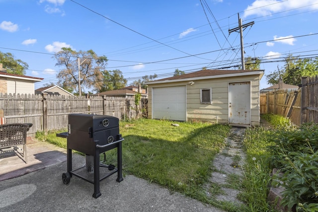 3914 Madison St, Bellwood, IL 60104 - fenced backyard with an outdoor structure and a patio