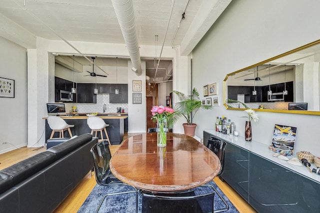 124 W Polk St Unit 603, Chicago, IL 60605 - dining space with a ceiling fan and light wood-style flooring