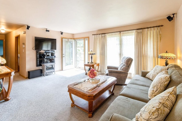 1550 Marshall Dr, Des Plaines, IL 60018 - living room with carpet flooring and a wood stove