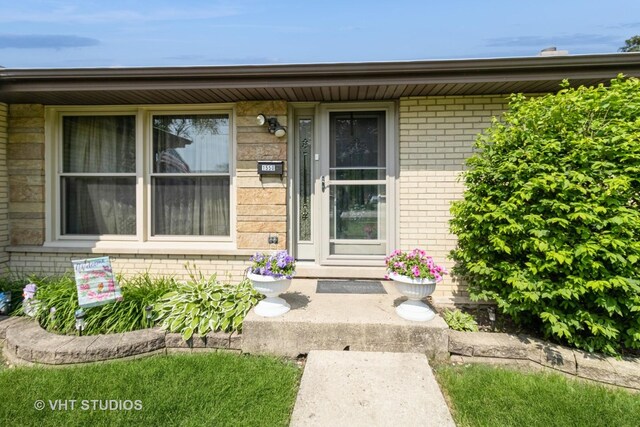 1550 Marshall Dr, Des Plaines, IL 60018 - view of exterior entry featuring brick siding