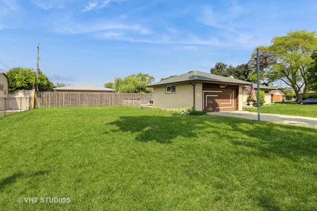 1550 Marshall Dr, Des Plaines, IL 60018 - view of yard featuring concrete driveway and a garage