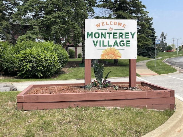 786 Delmar Ct Unit 6, University Park, IL 60484 - community / neighborhood sign featuring a lawn