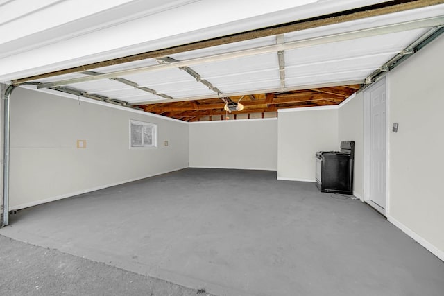 17401 Emerson Ave, Hazel Crest, IL 60429 - garage with a garage door opener and baseboards