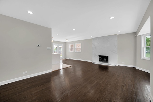 17401 Emerson Ave, Hazel Crest, IL 60429 - unfurnished living room featuring wood finished floors, a high end fireplace, and recessed lighting
