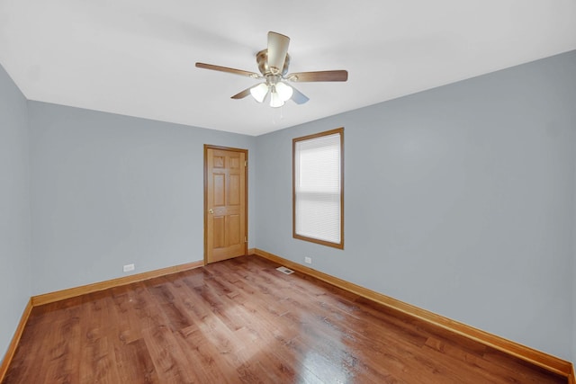 1515 E 85th St, Chicago, IL 60619 - empty room featuring light wood finished floors and ceiling fan