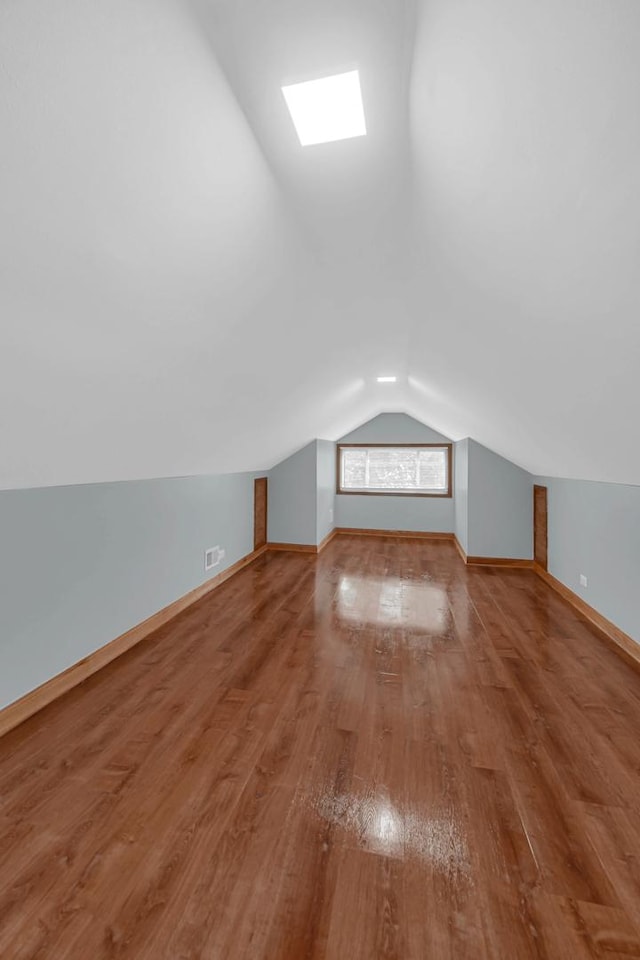 1515 E 85th St, Chicago, IL 60619 - additional living space featuring lofted ceiling and wood finished floors