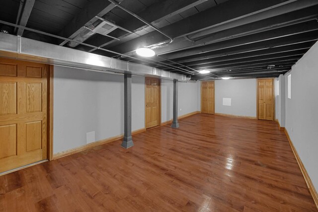 1515 E 85th St, Chicago, IL 60619 - finished below grade area featuring wood finished floors and baseboards