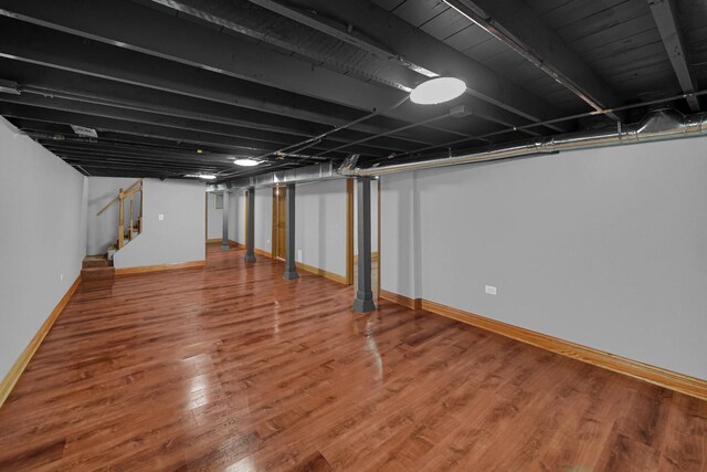 1515 E 85th St, Chicago, IL 60619 - finished basement with stairway and wood finished floors
