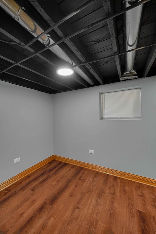 1515 E 85th St, Chicago, IL 60619 - finished basement featuring baseboards and wood finished floors