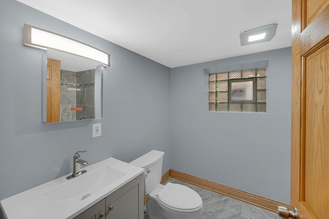 1515 E 85th St, Chicago, IL 60619 - bathroom featuring vanity, marble look tiles, and a shower
