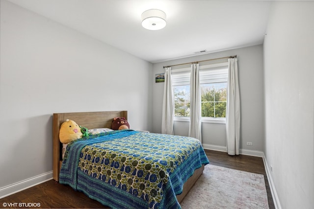 1780 Prairie Ave, Northbrook, IL 60062 - bedroom with dark wood-style floors and baseboards