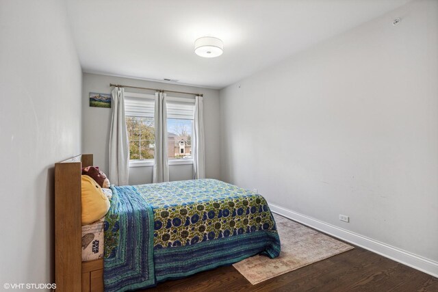 1780 Prairie Ave, Northbrook, IL 60062 - bedroom featuring wood finished floors and baseboards