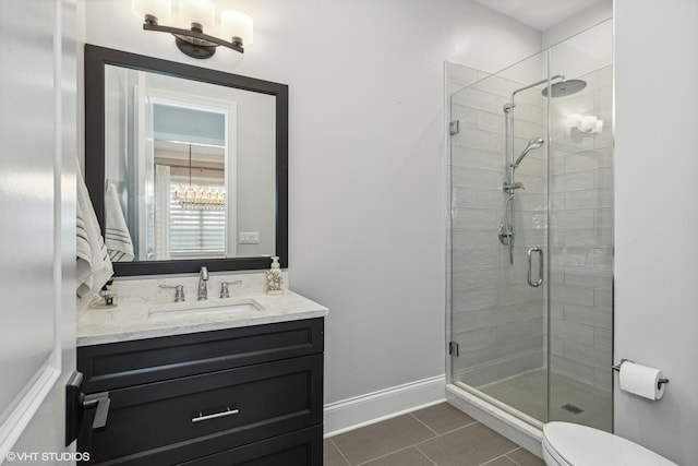 1780 Prairie Ave, Northbrook, IL 60062 - bathroom featuring a stall shower, vanity, and tile patterned flooring