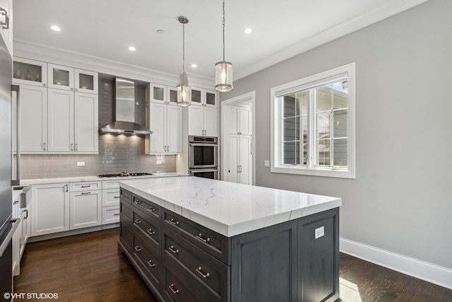 1780 Prairie Ave, Northbrook, IL 60062 - kitchen with wall chimney range hood, white cabinets, gas cooktop, tasteful backsplash, and glass insert cabinets
