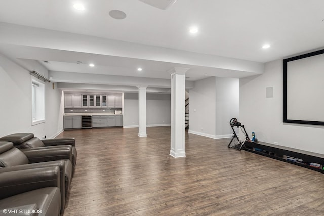 1780 Prairie Ave, Northbrook, IL 60062 - home theater featuring wine cooler, dark wood-style flooring, recessed lighting, and bar area