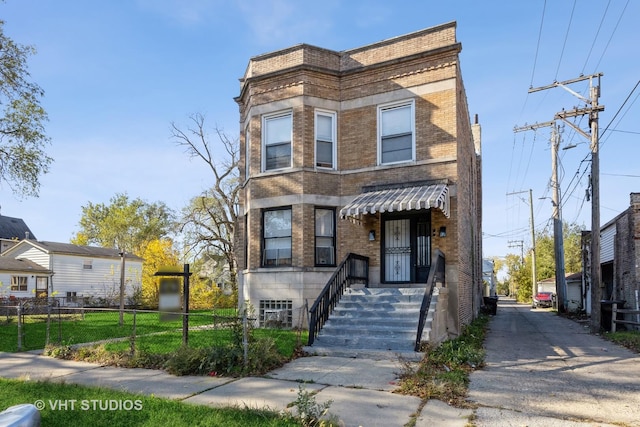 7514 S Dante Ave, Chicago, IL 60619 - townhome / multi-family property featuring brick siding