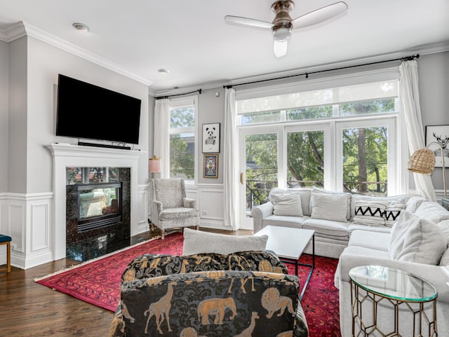 2052 W Chicago Ave Unit 2, Chicago, IL 60622 - living area with wood finished floors, a fireplace, ornamental molding, a ceiling fan, and a decorative wall