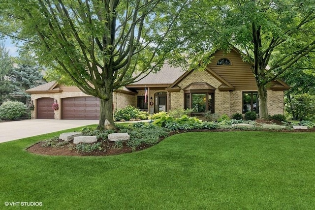 401 Woodside Dr, Wood Dale, IL 60191 - view of front of property with driveway, brick siding, a front yard, and an attached garage