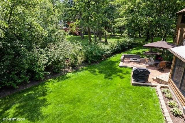 401 Woodside Dr, Wood Dale, IL 60191 - view of grassy yard featuring a patio