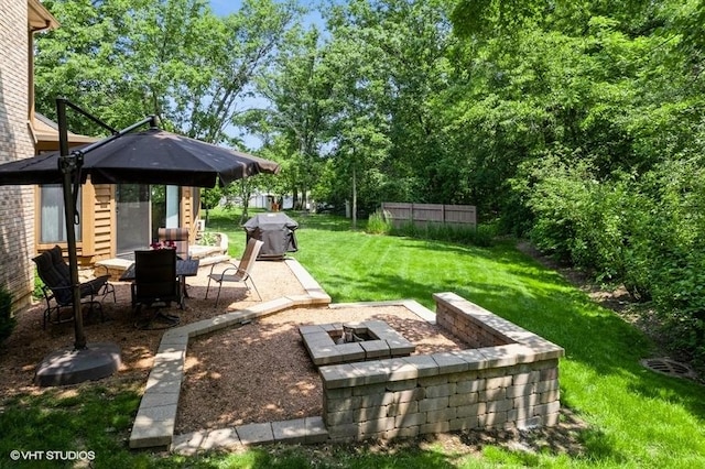 401 Woodside Dr, Wood Dale, IL 60191 - view of green lawn featuring a fire pit and a patio