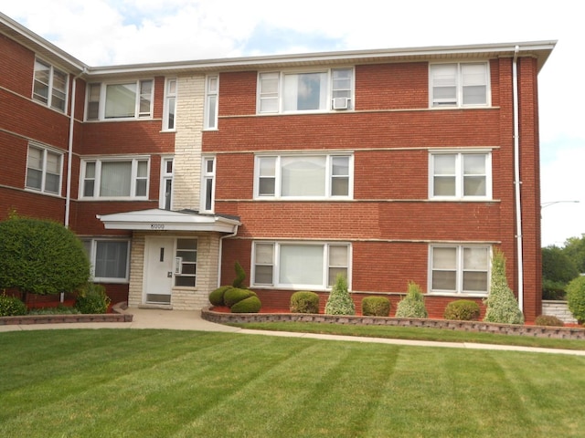 8000 S Pulaski Rd Unit 301, Chicago, IL 60652 - view of front of property featuring brick siding and a front yard