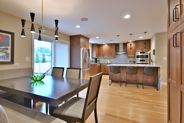 717 S Washington St, Elmhurst, IL 60126 - dining room with light wood-type flooring and recessed lighting