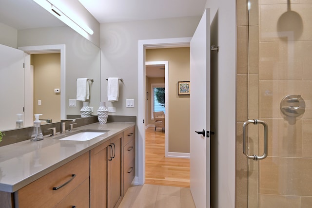 717 S Washington St, Elmhurst, IL 60126 - full bath with vanity, a stall shower, and tile patterned floors