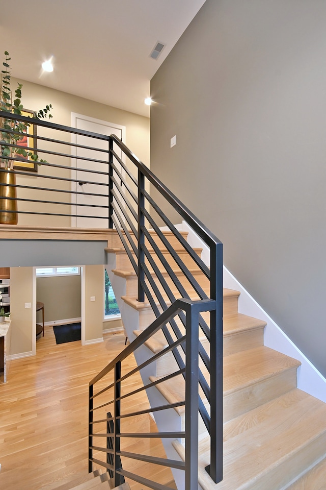 717 S Washington St, Elmhurst, IL 60126 - stairway with wood finished floors and recessed lighting