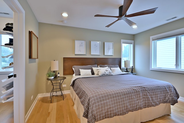 717 S Washington St, Elmhurst, IL 60126 - bedroom featuring light wood-style floors, multiple windows, recessed lighting, and ceiling fan