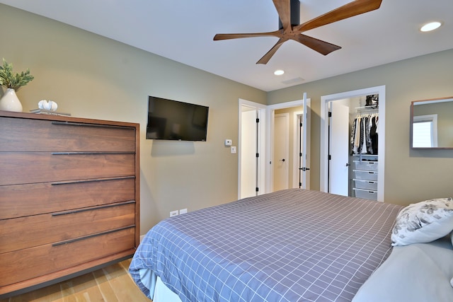 717 S Washington St, Elmhurst, IL 60126 - bedroom featuring recessed lighting, light wood-style floors, ceiling fan, and a closet