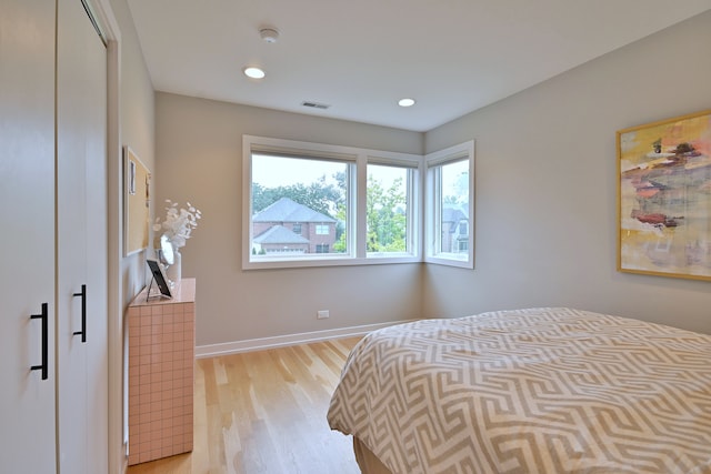 717 S Washington St, Elmhurst, IL 60126 - bedroom with light wood-type flooring and recessed lighting