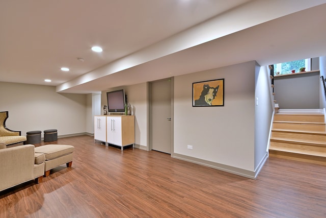 717 S Washington St, Elmhurst, IL 60126 - living area with wood finished floors, recessed lighting, and stairs