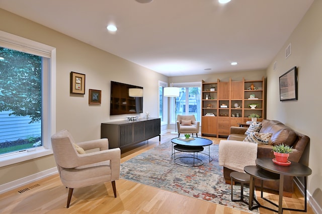 717 S Washington St, Elmhurst, IL 60126 - living room with light wood-style floors and recessed lighting