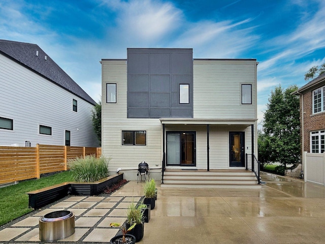717 S Washington St, Elmhurst, IL 60126 - rear view of property with a patio area